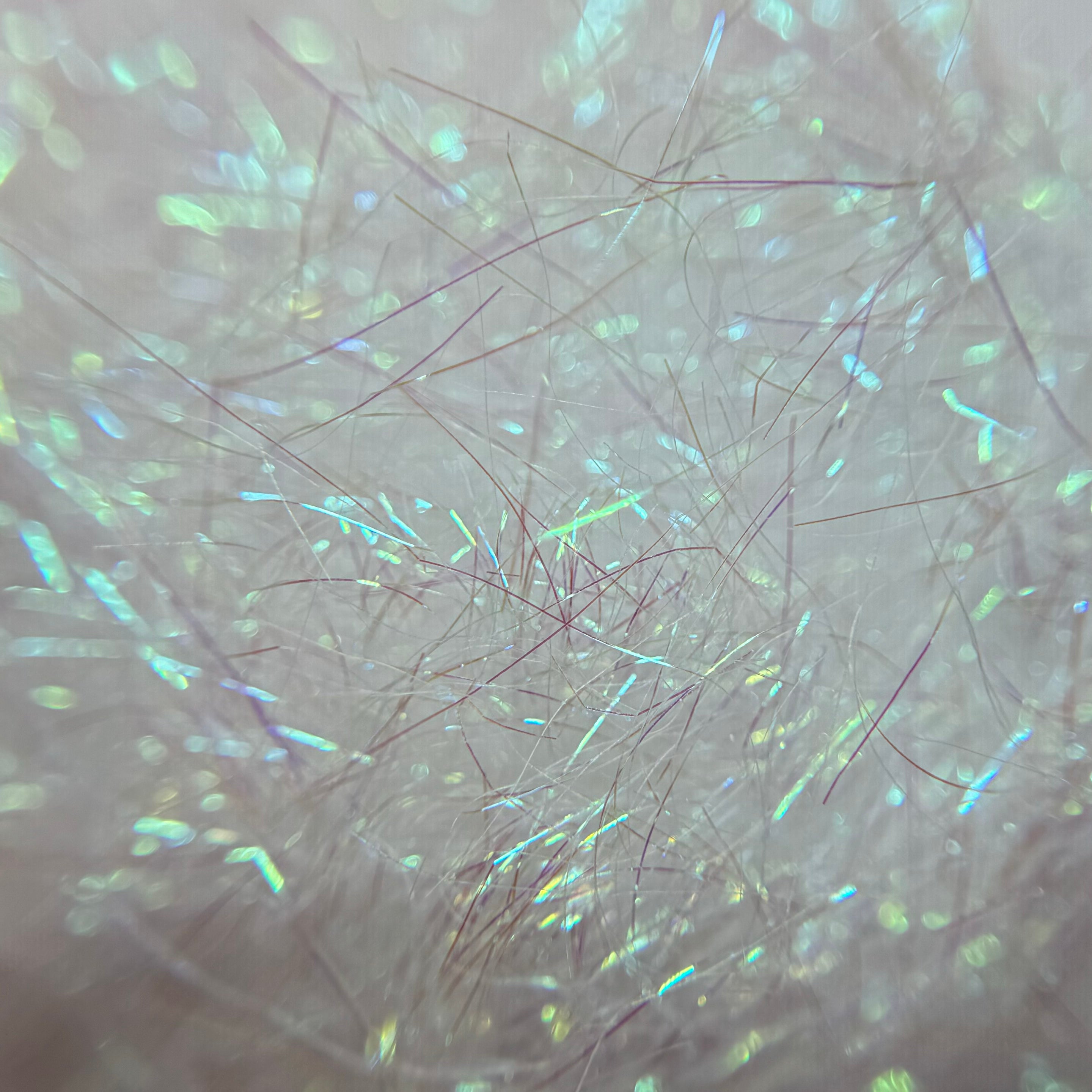 Close-up of iridescent Angelina fibers (aurora)